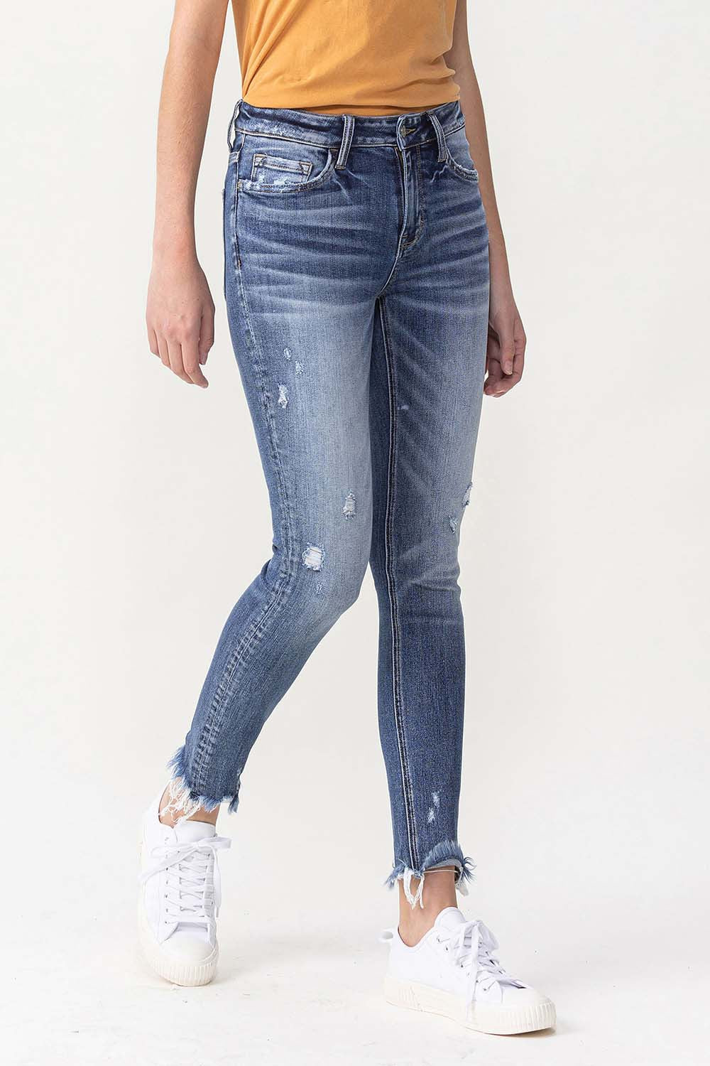 LOLA MID RISE ANKLE SKINNY JEANS WITH FRAYED HEM DETAIL